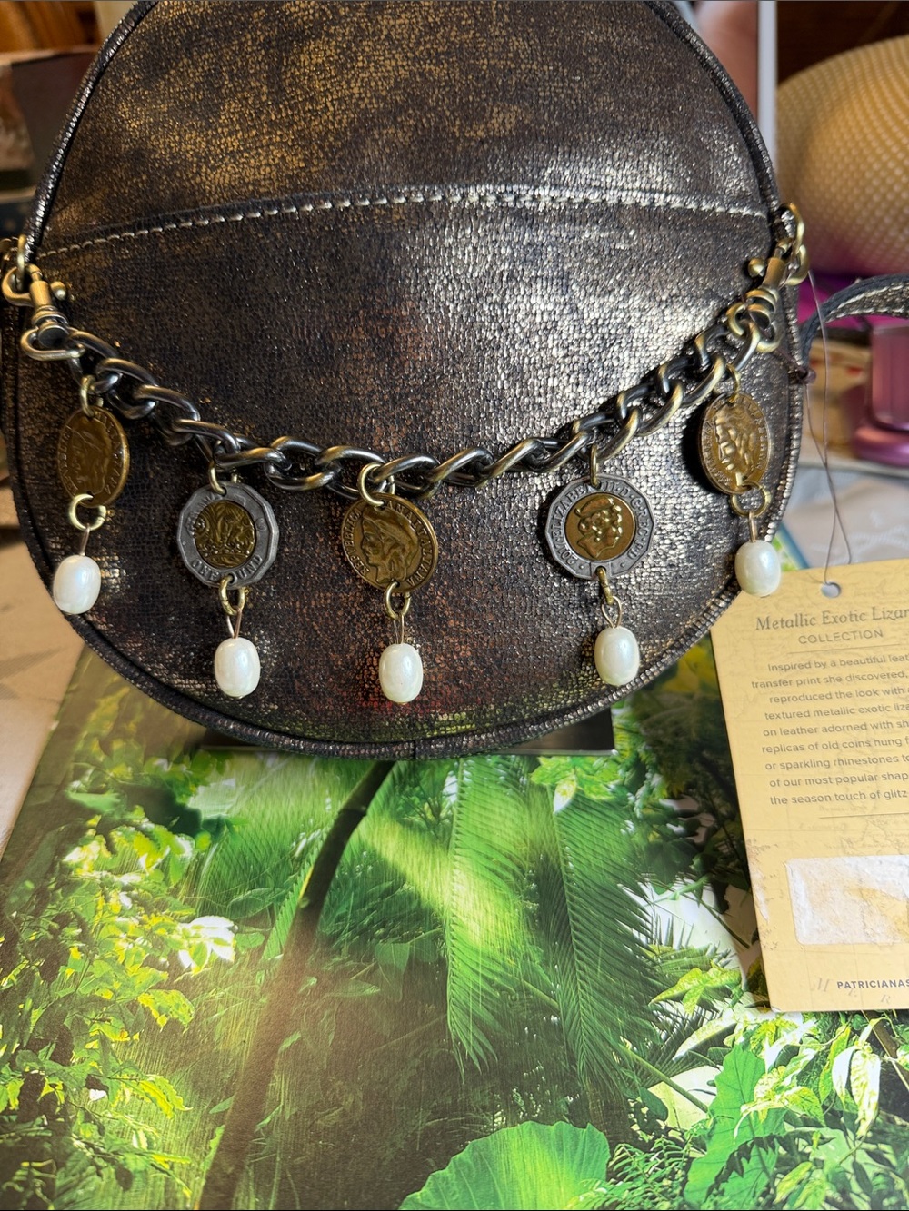 Metallic Black Round Charm Crossbody Bag with Coin & Pearl Accents